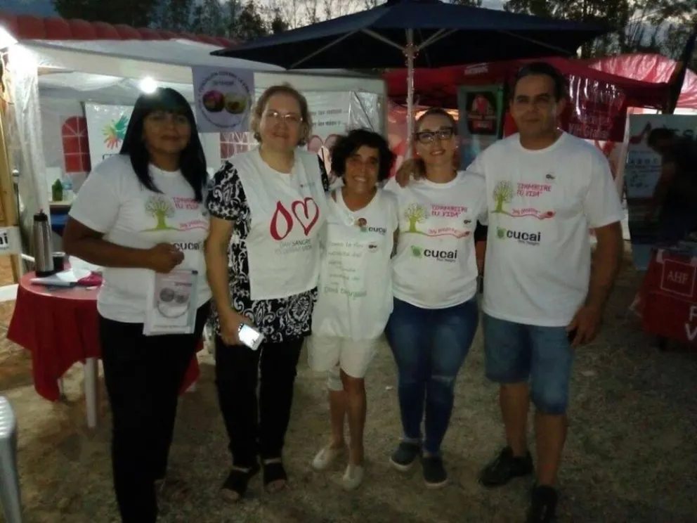 El equipo de trabajo a pleno en la Fiesta Nacional de la Manzana. 